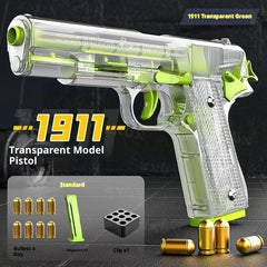 Transparent model pistol labeled '1911' with green accents on a dark background