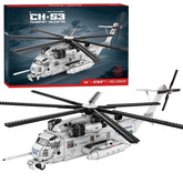 Toy helicopter set with CH-53 Transport Helicopter packaging in the background