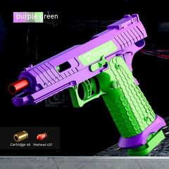 Purple and green toy gun with cartridges on a dark background
