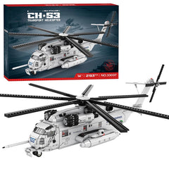 Toy helicopter set with CH-53 Transport Helicopter packaging in the background