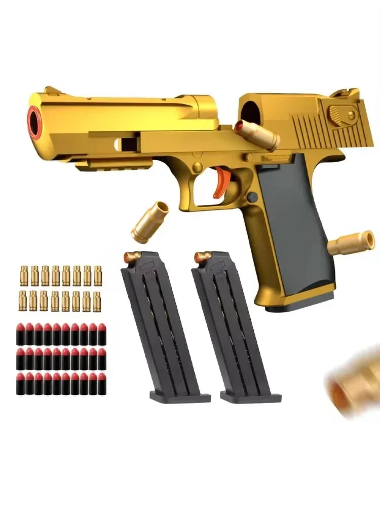 Gold toy gun with black magazines and bullets on a white background
