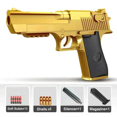 Gold toy gun with black grip on a white background