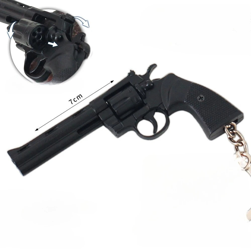 Black revolver keychain with chain on a white background