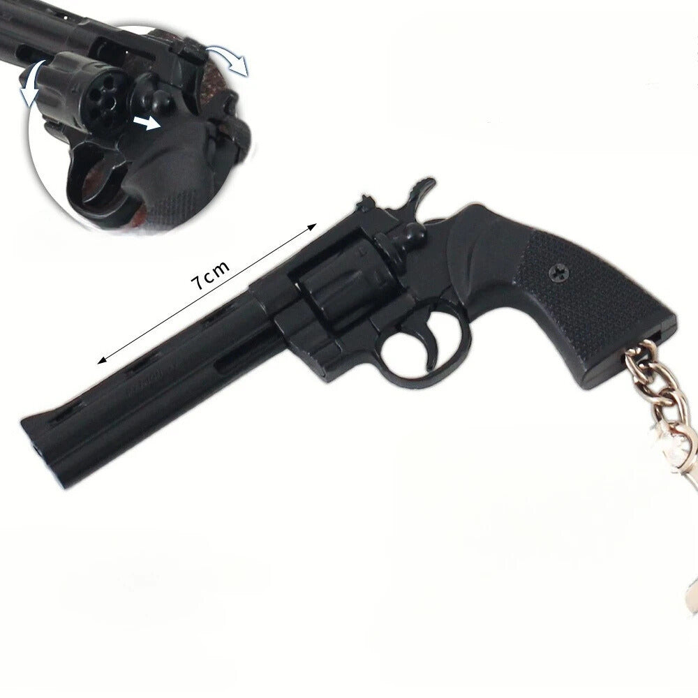 Black revolver keychain with chain on a white background