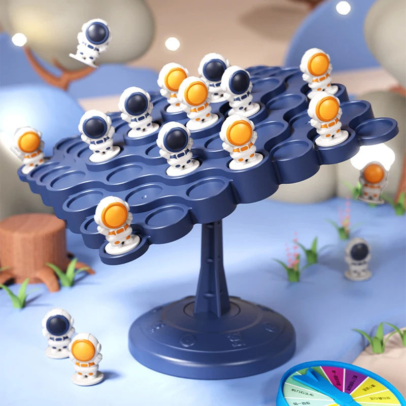 Kids balance tree board game with astronaut figures