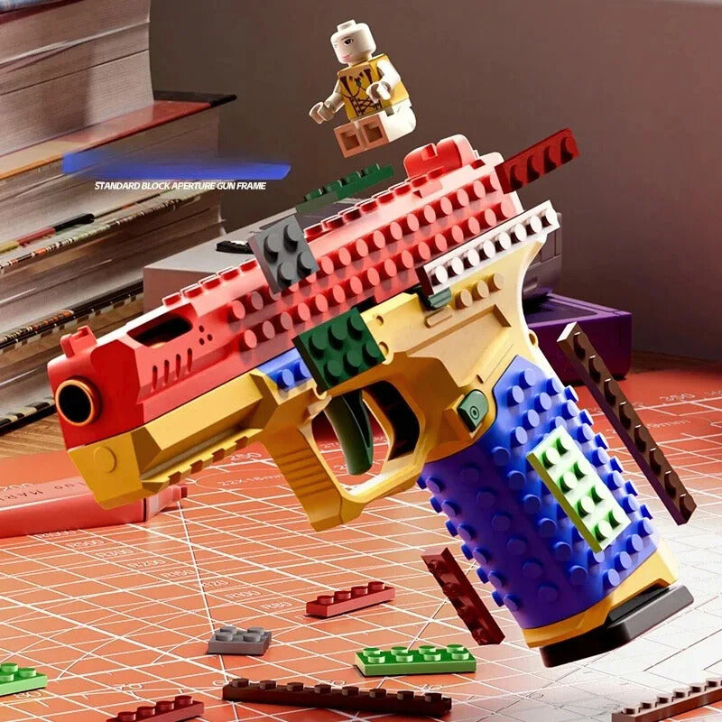 Side angle of colorful LEGO-compatible brick pistol toy model.