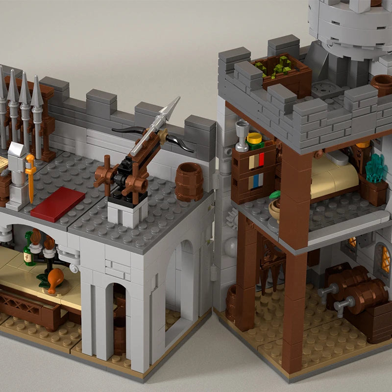 Detailed  model of a castle with various structures and accessories on a neutral background