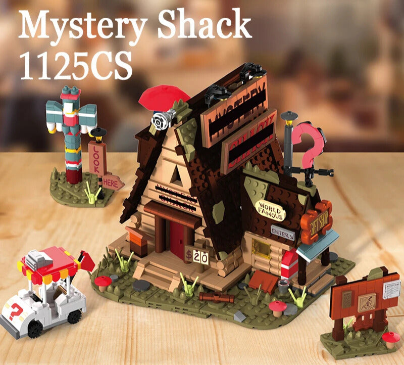 Toy set resembling the Mystery Shack from 'Gravity Falls' on a wooden surface.