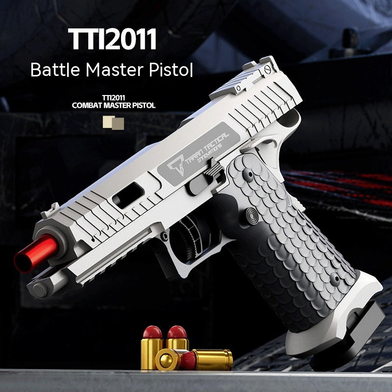 Toy gun labeled 'TT12011 Battle Master Pistol' with bullets on a dark background