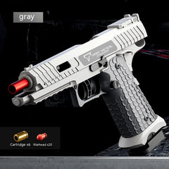 Gray toy gun with red tip on a black background