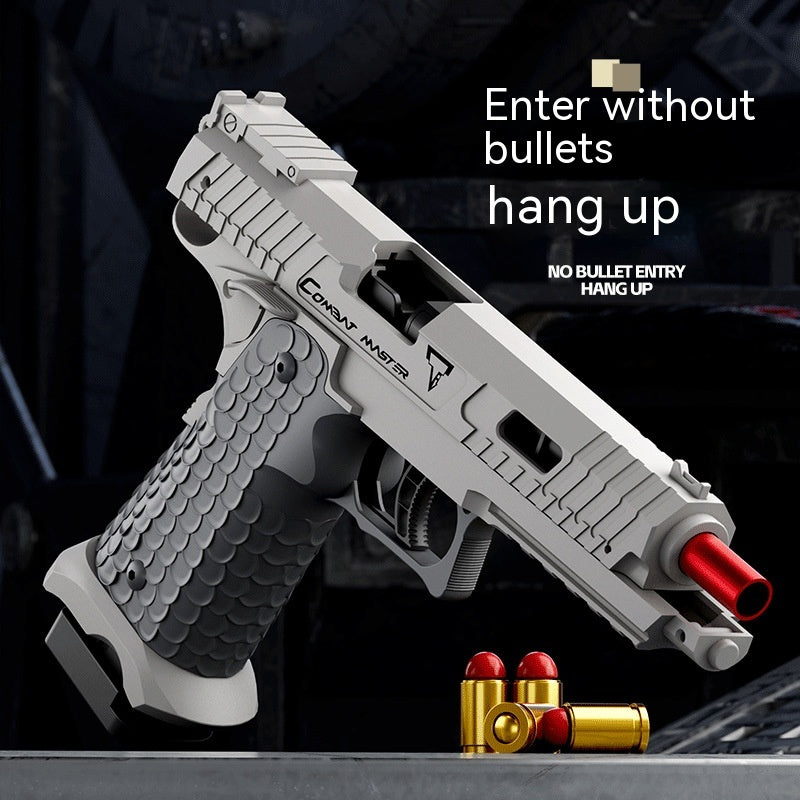 Toy gun with red and gold bullets on a dark background