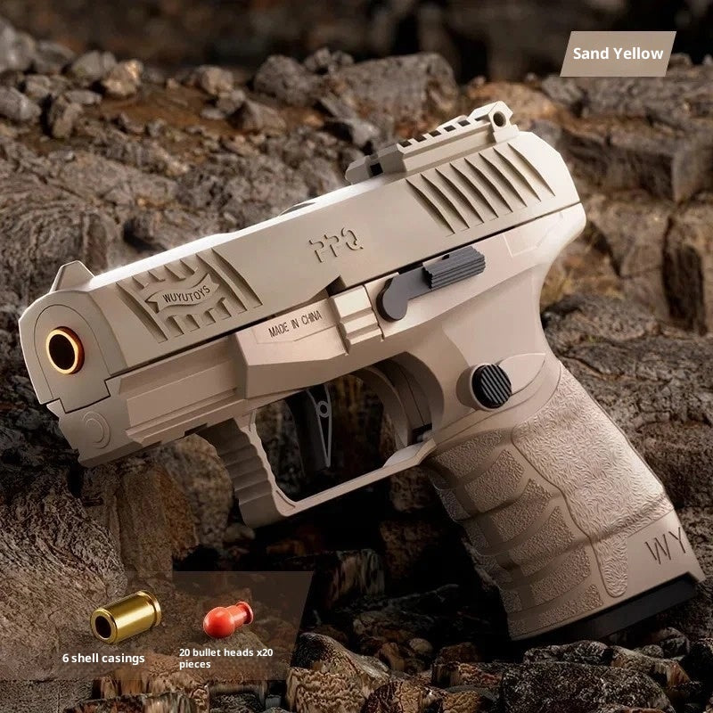 Toy gun with detailed design on a rocky background