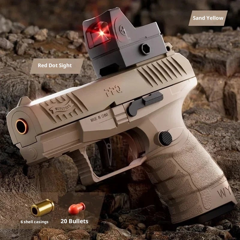 Tan handgun with red dot sight on rocky background