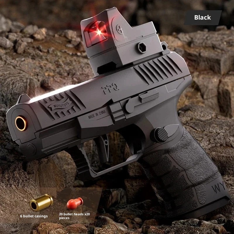 Toy gun with red light on a rocky background